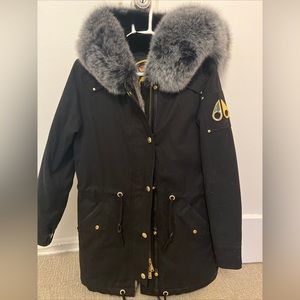Moose Knuckles Black Parka with Gray Fur Trim